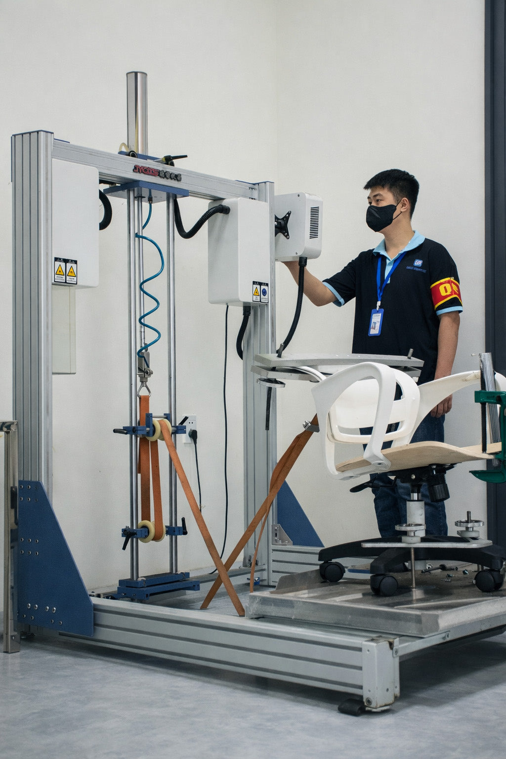 Quality control testing of office chair durability and safety standards